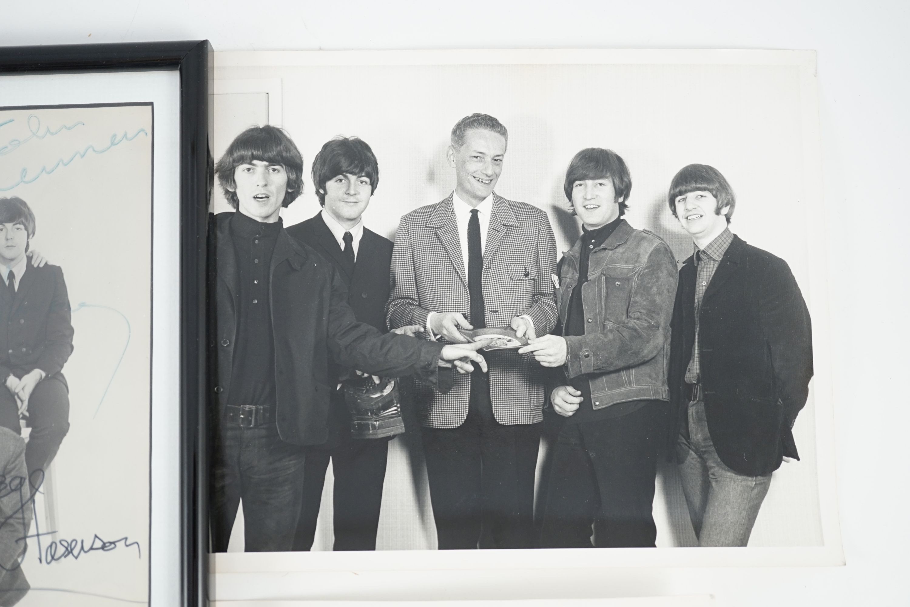 An autographed Beatles photograph and four related photographs of the Beatles with Peter Aldersley Autographed photo 19.5 x 14.5cm.